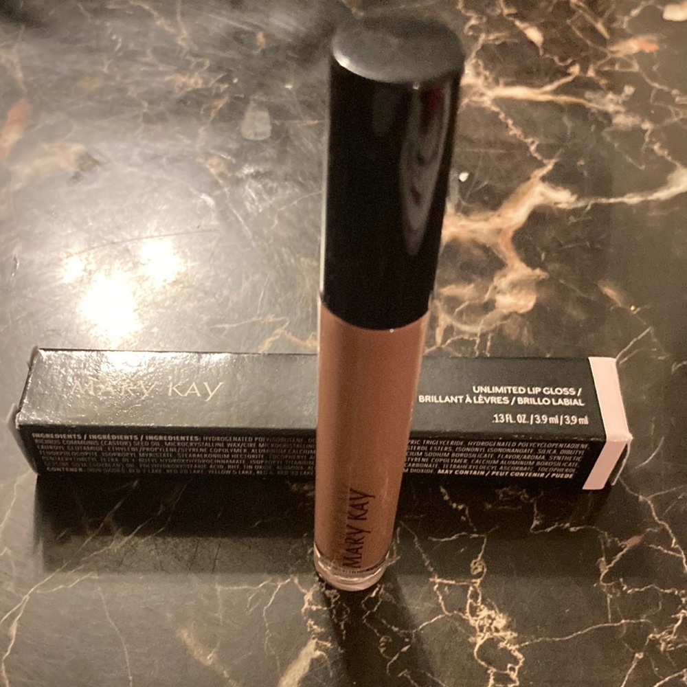 Brand new unlimited lip gloss in Tammy nude.